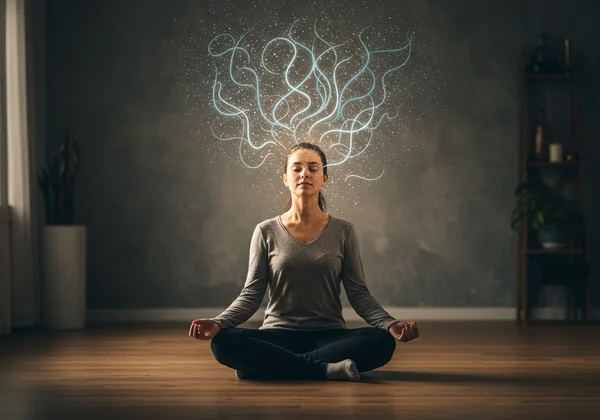 Seseorang bermeditasi dengan tenang, dikelilingi oleh fikiran yang tenang dan mengalir